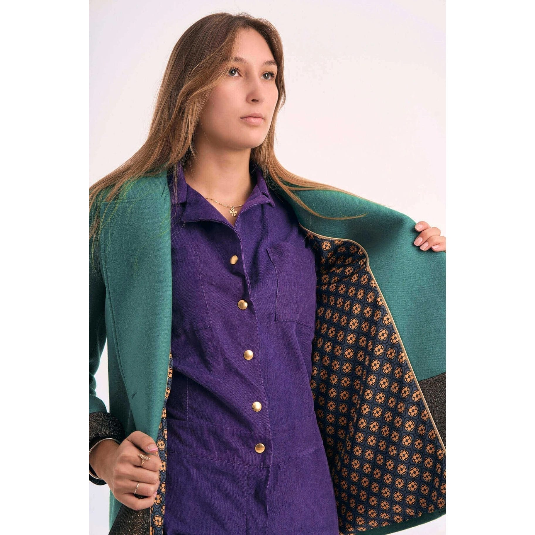 Sublime green jacket with golden details